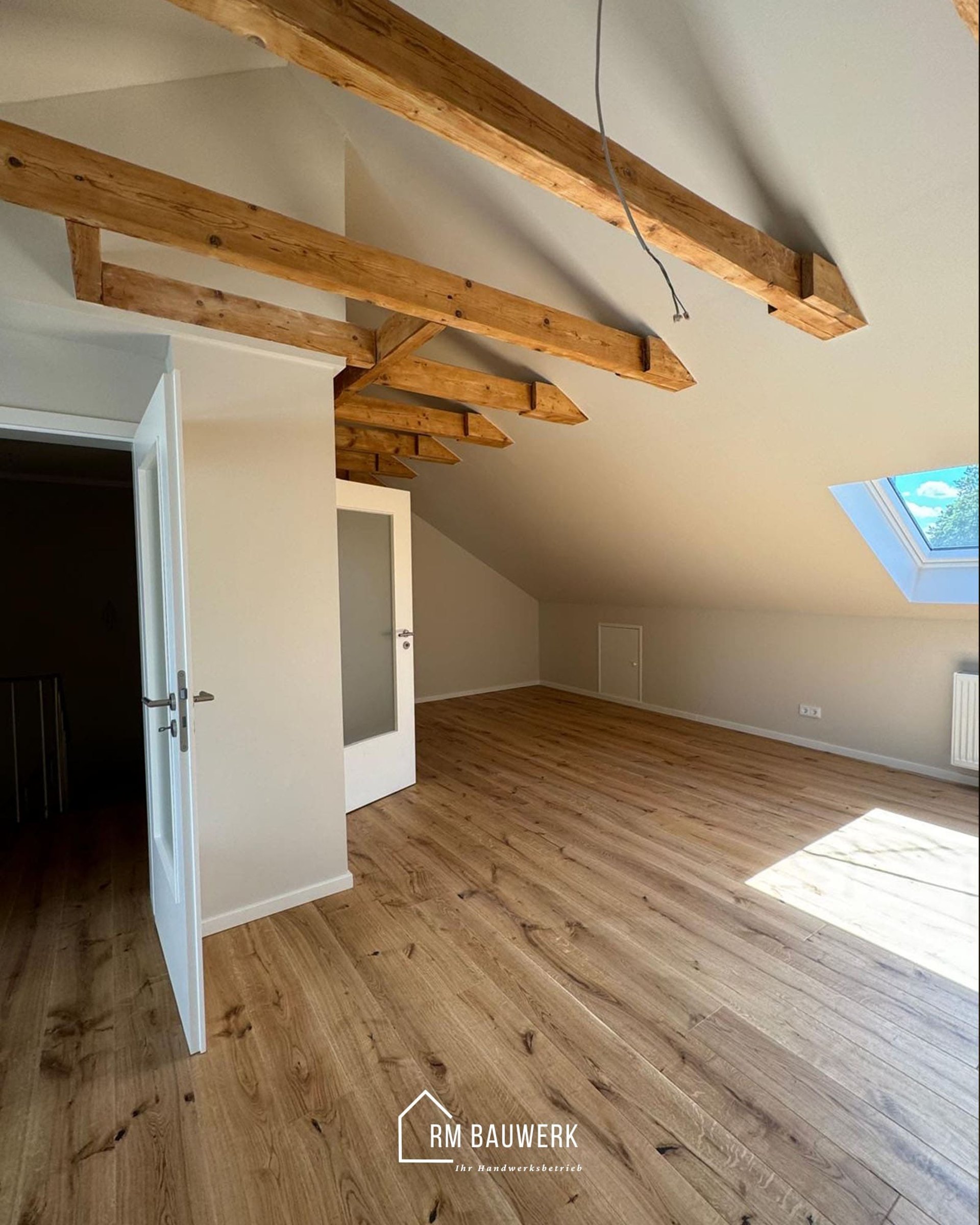 Dachausbau mit Holzbalken